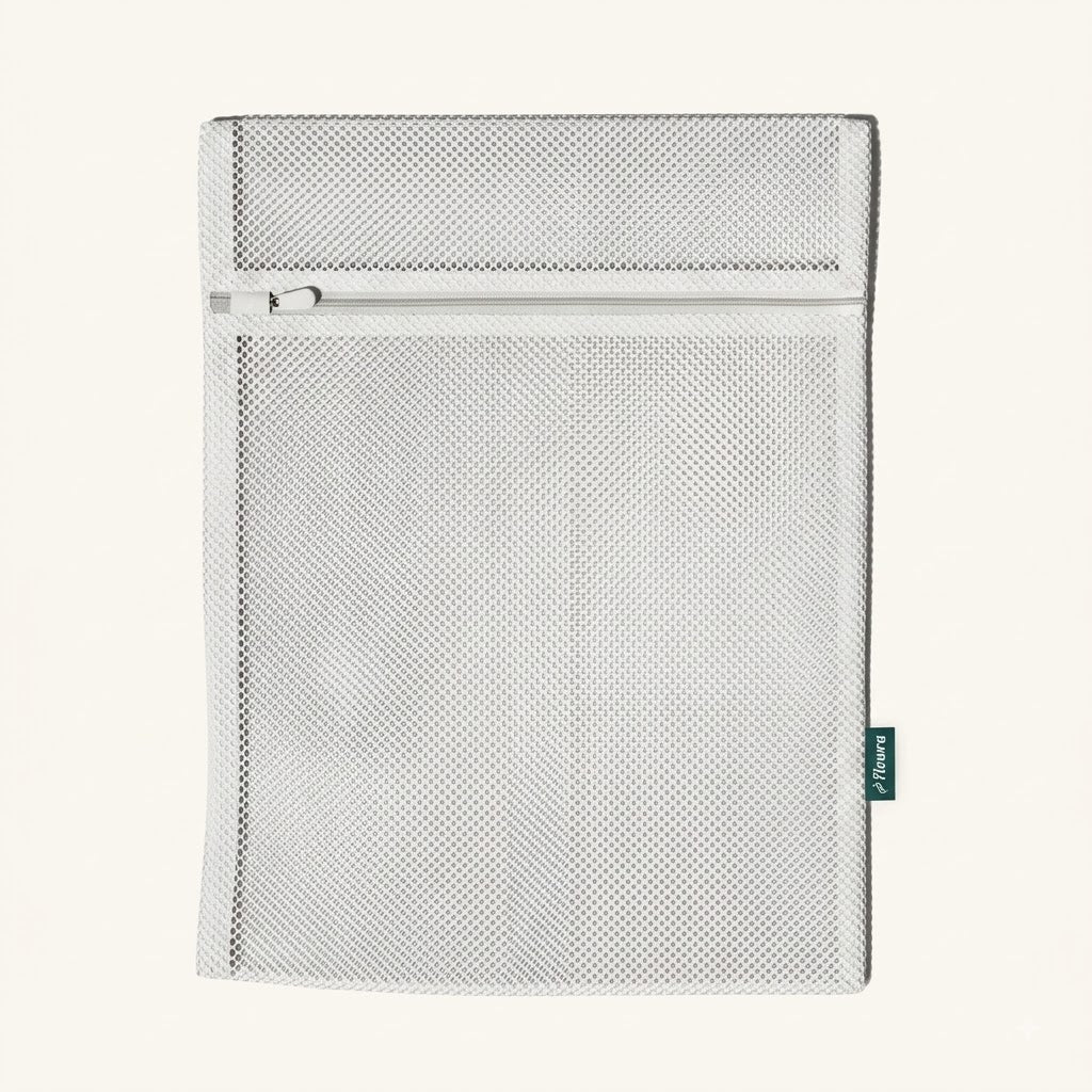 Flowra Premium Wash Bag — mesh laundry bag with zip closure and Flowra logo tag