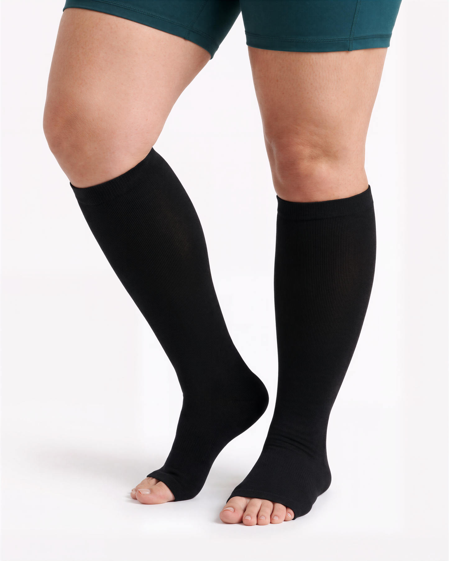 Wide Calf open-toe compression sock in Classic Black, alternate pose showing open toe construction