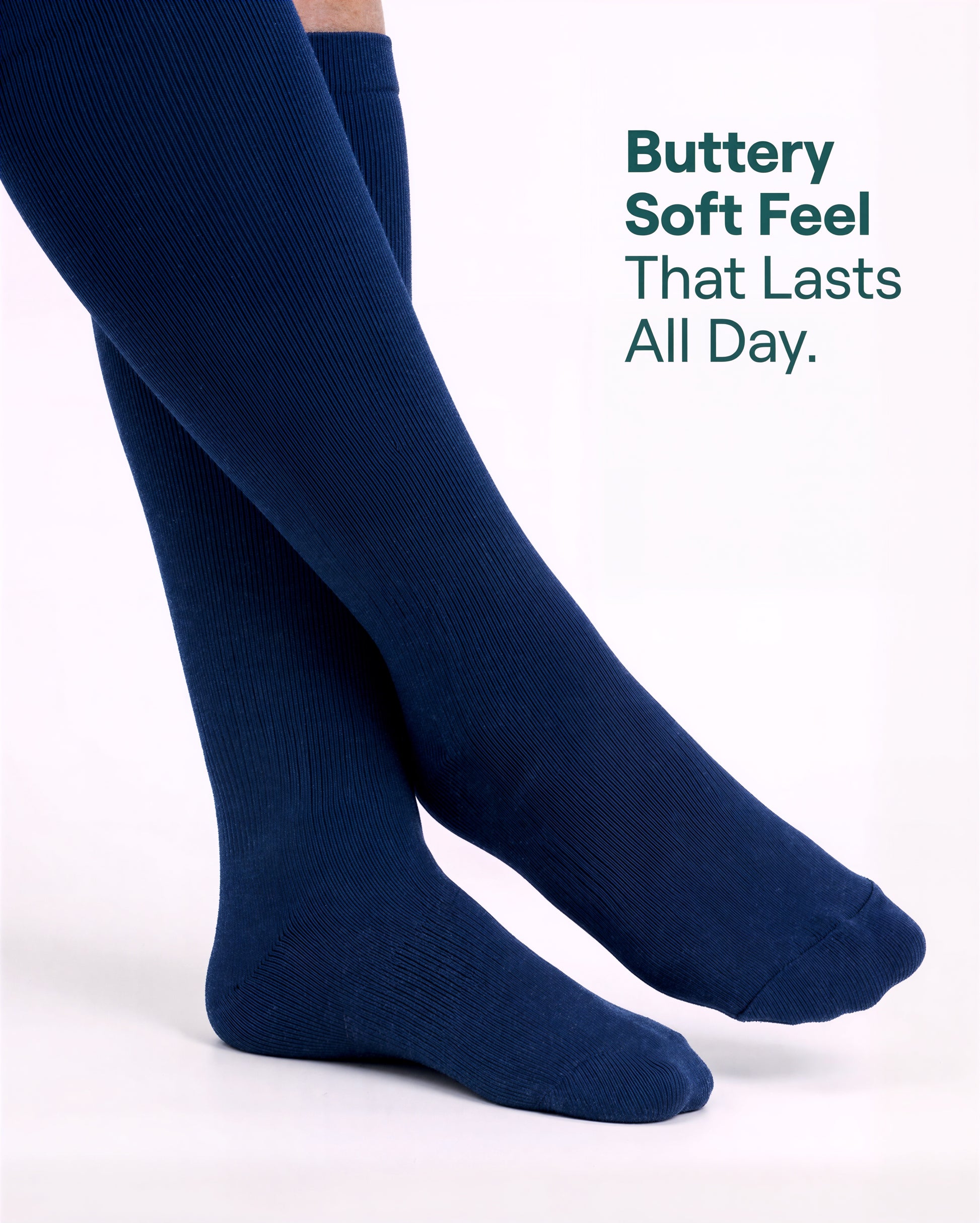 Wide Calf compression sock in True Navy with "Buttery-Soft Feel That Lasts All Day" text